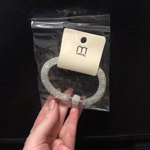 Clear bracelet with stones inside